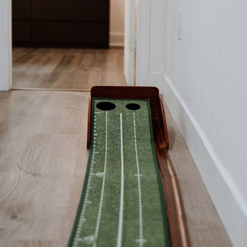 - practice your short game right in the hallway with this sleek mini putting setup
- two hole target lets you refine aim and distance with every stroke
- fun, stress free way to unwind between adventures or before bed