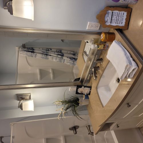 Bathroom #3 (larger house, main floor):  this is the private en suite full bathroom for bedroom #2.