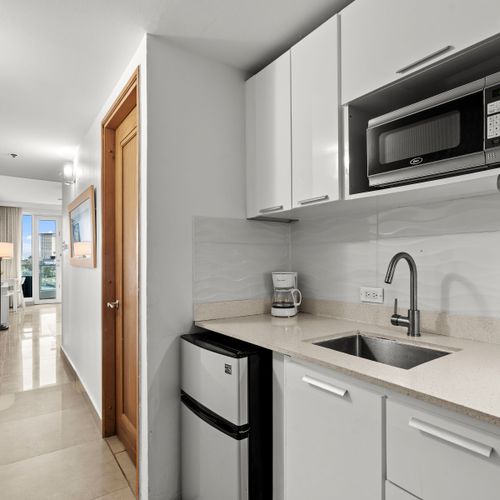 Experience a seamless transition from entry to your stylish studio, complete with essential kitchen amenities.