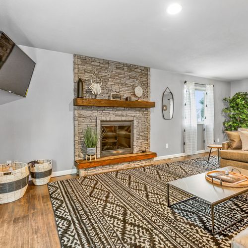 The living space comes complete with a spacious sectional, and a large widescreen tv. Please note the indoor fireplace is not operable at this time.