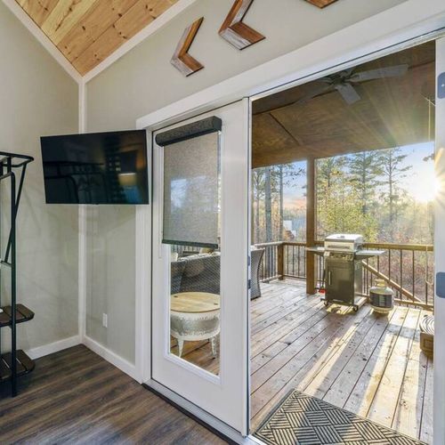 The door leads straight to the covered patio. Enjoy the hot tub steps from bed!