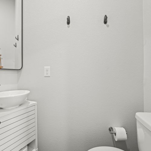 A master bedroom ensuite where simplicity meets spotless cleanliness.