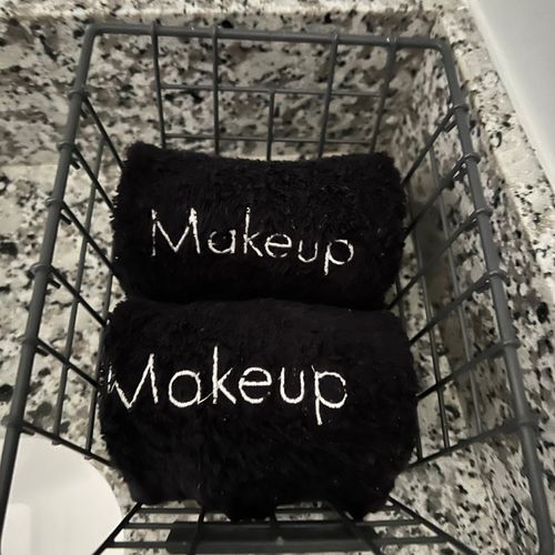 Soft makeup towels folded & ready — a thoughtful touch for every guest.