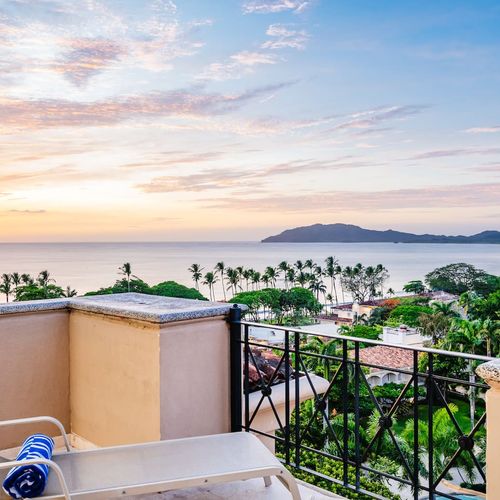 Watch the sunset over Tamarindo Bay