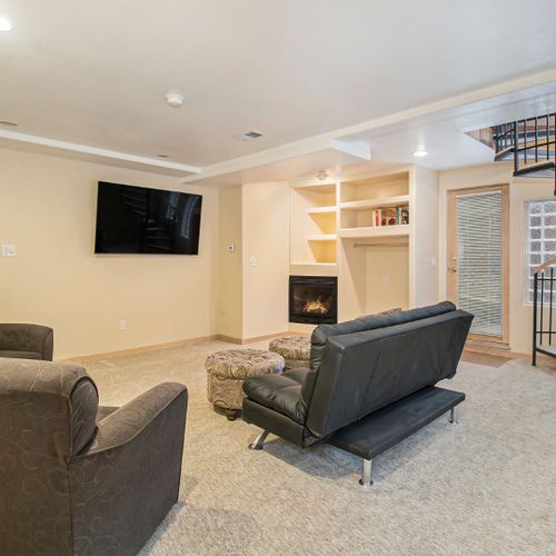 Lower level space perfect for unwinding or watching tv.