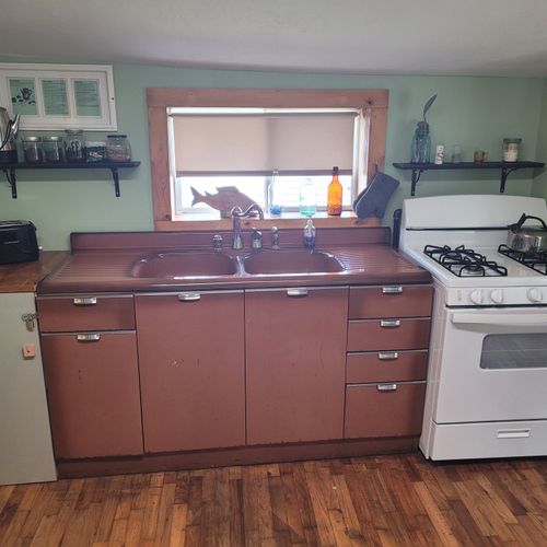 Kitchen:  the kitchen with the sink and stove