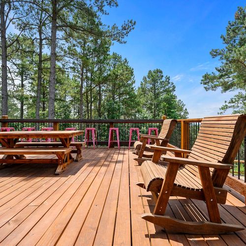 Rocking chairs, picnic tables and bar tops can all be found on the patio!