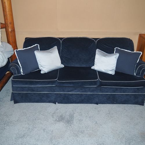 Bedroom #4 (second floor):  features a queen-size bed, private television, sofa bed, comfy chair, ceiling fan, baby crib, and a dresser.