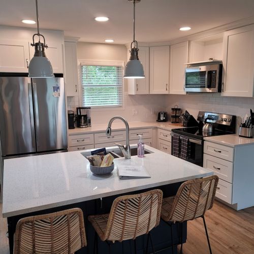 Kitchen:  there is a full kitchen with all-new stainless steel appliances (including a dishwasher), a good supply of cooking and dining utensils, and lots of cupboard and counter space.