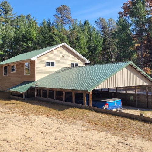 Exterior:  the carport, which easily covers 2 large vehicles.