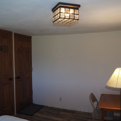 Bedroom #1:  features a queen-size bed, desk, and a nice view of lake michigan!