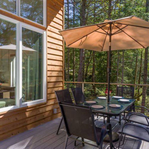 With plenty of trees and privacy, the home has over an acre of forest surrounding it.
