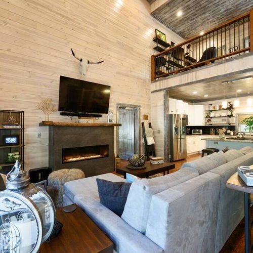 The living room seamlessly connects to the kitchen.