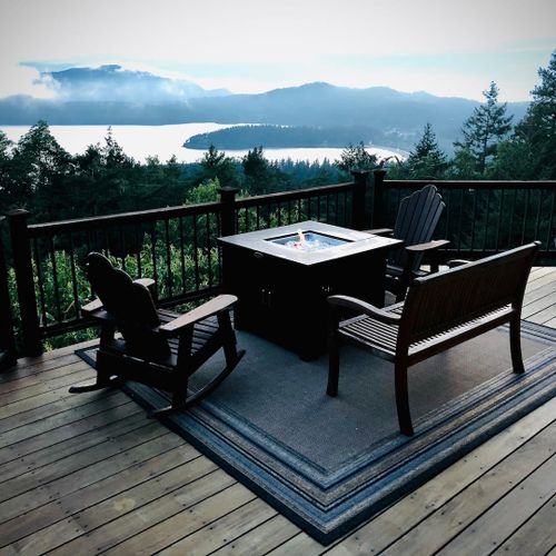 Gas outdoor firepit lures you to sit outside in all weather..