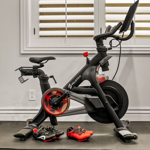 The fitness area includes a stationary bike for low-impact, high-reward exercise.