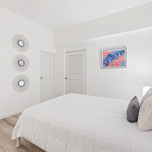 A serene space for slumber. Settle into this comfy bed for a peaceful night.