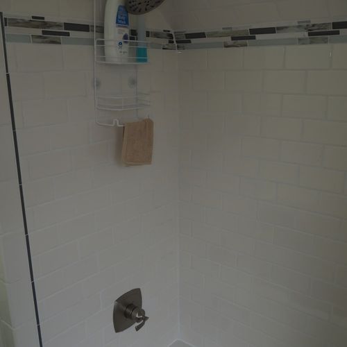 Bathroom #2 (upstairs):  there is a full bathroom upstairs with a combination bathtub / shower, toilet, vanity, sink, and mirror.