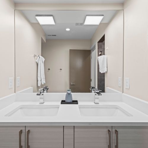 Enjoy double vanities in the master bedroom