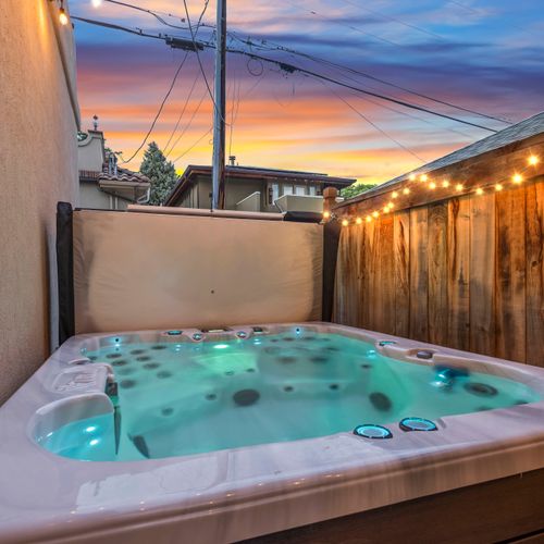 An evening soak with sunset views—this hot tub moment defines relaxation.