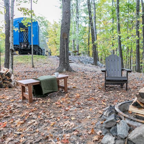 Firepit with cozy Adirondack chairs.
