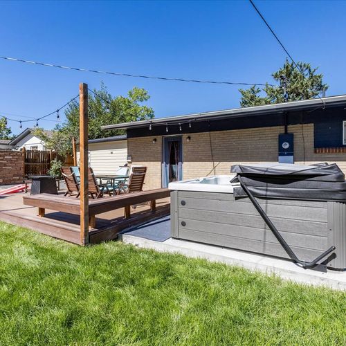 - soak in the private hot tub or kick back on the patio under string lights
- this backyard retreat has space for lounging, dining, and late night chats
- perfect for relaxation after a hike, ski day, or downtown denver adventure