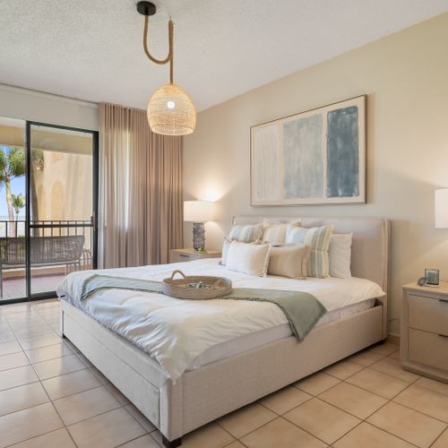 A perfect retreat: unwind in the master bedroom, where comfort meets the beauty of your private outdoor space.