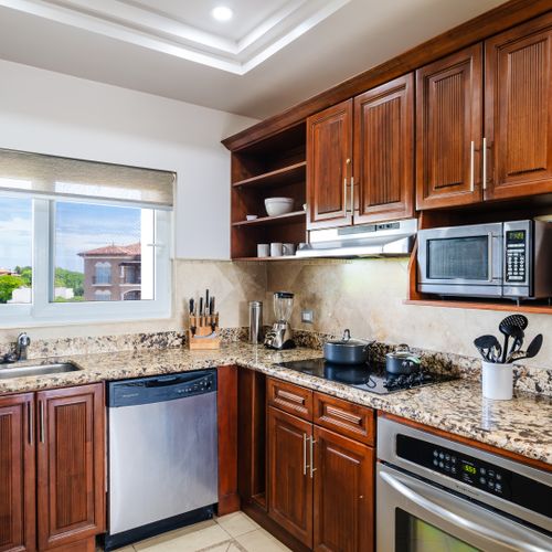 Full kitchen with jungle views