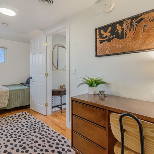 Take a break from the workday in the dedicated workspace with its vintage desk and office chair.