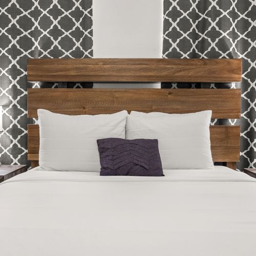 Comfortable and inviting sleeping arrangements.