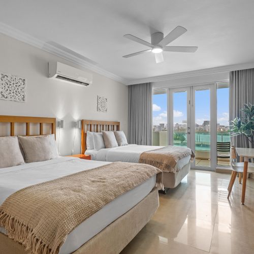 Rest easy on high-quality mattresses, promising a rejuvenating experience for all guests