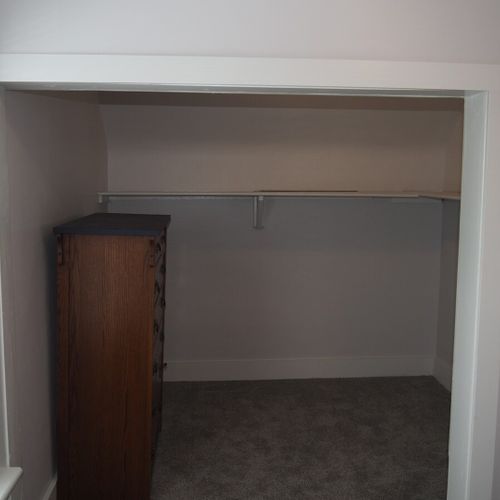 Bedroom #2:  all 3 bedrooms are upstairs. This bedroom features a queen-size bed, nightlamp, dresser, and a very large closet.