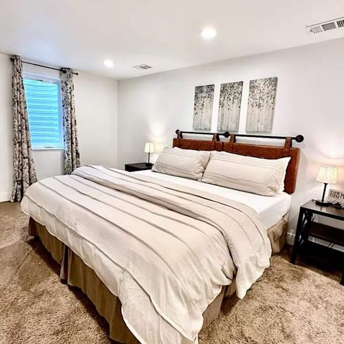 Escape to your own private oasis lower level master bedroom with a beautifully appointed ensuite bath.