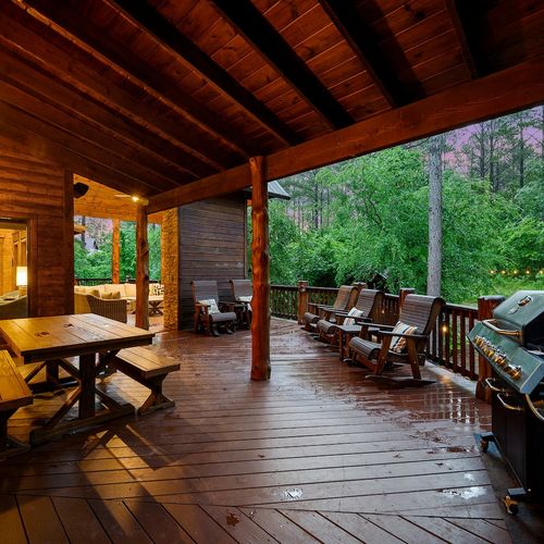 Dining area, gas grill, and rocking chairs on the patio!
