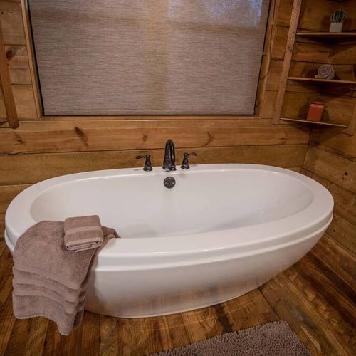 A soaking tub is also in the Master Bath!