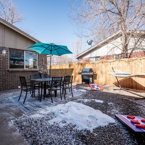 Enjoy privacy and peace of mind in our beautifully enclosed front yard. Please note the patio furniture may be put into storage during the winter months.