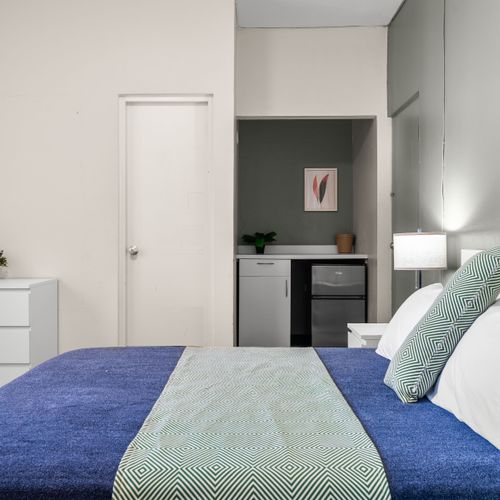 Tranquil bedroom with a comfortable bed for a peaceful escape.