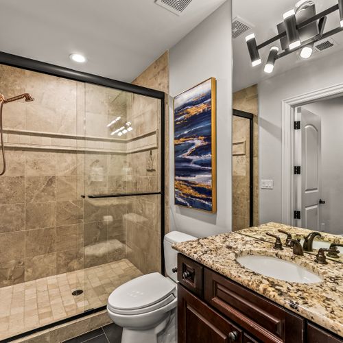 Walk-in luxury—glass walls, clean lines, and plenty of space.