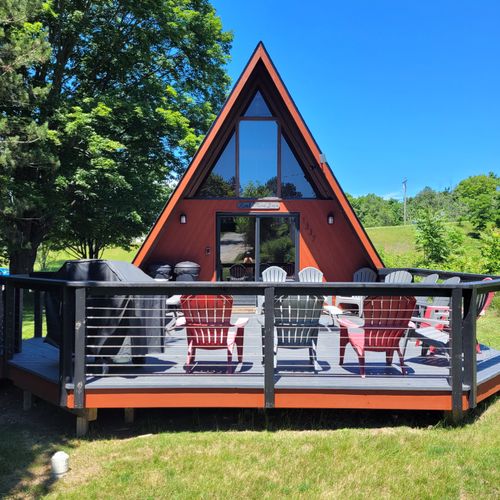 Exterior:  looking at the deck from the large front yard