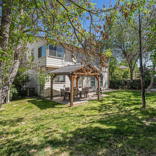 Stretch out on the lawn or gather under the shaded patio—your choice!