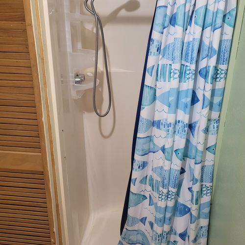 Bathroom:  the shower in the bathroom