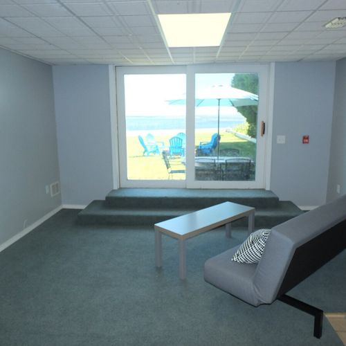 Living room:  another angle showing the sofa and its view of lake huron.