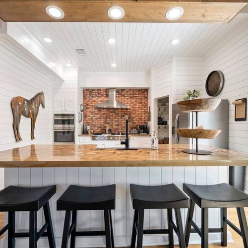 4 seats at the island in the kitchen!