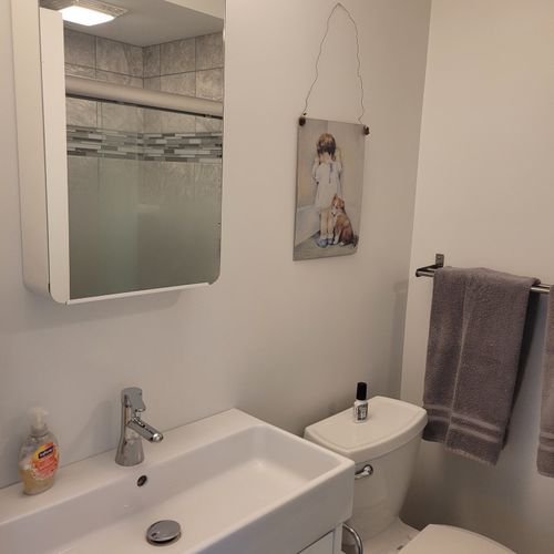 BATHROOM #1:  Full bathroom with walk-in shower that is a private ensuite bathroom for Bedroom #1.