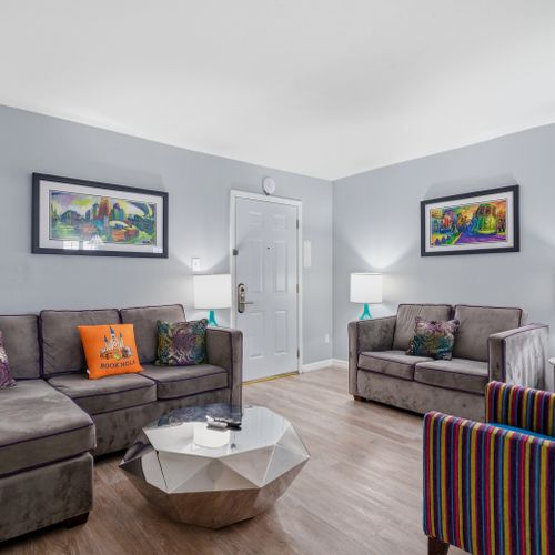 Modern living area w/ Smart TV & comfy seating for movie nights in.