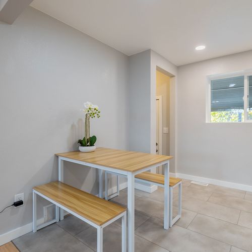 Grab a bite or quick snack at the benched dining set.