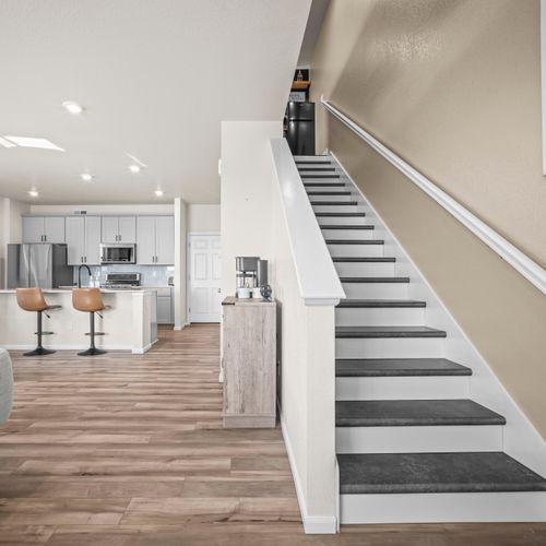 Open layout with easy flow between kitchen, dining, and living spaces.