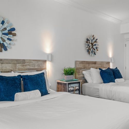 Enjoy the best of both worlds in this versatile space, offering comfortable sleeping arrangements for four, a convenient table for dining or remote work, and a gorgeous ocean backdrop.