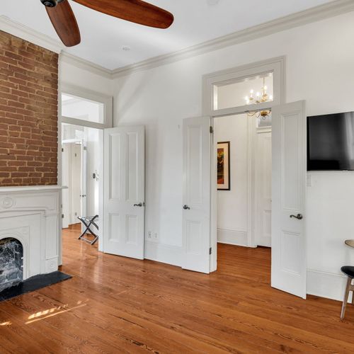 Classic elegance with exposed brick charm.