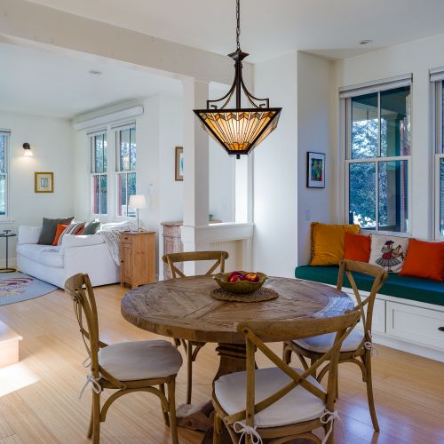 An open-concept dining and living space designed for relaxing, gathering, and feeling at home.