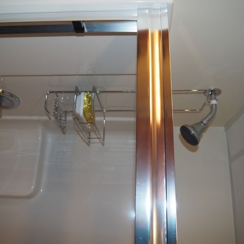 Bathroom:  full bathroom with a walk-in shower as well as a stacked washer and dryer.
